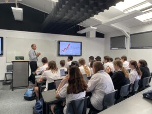 Students engaged in presentation 2