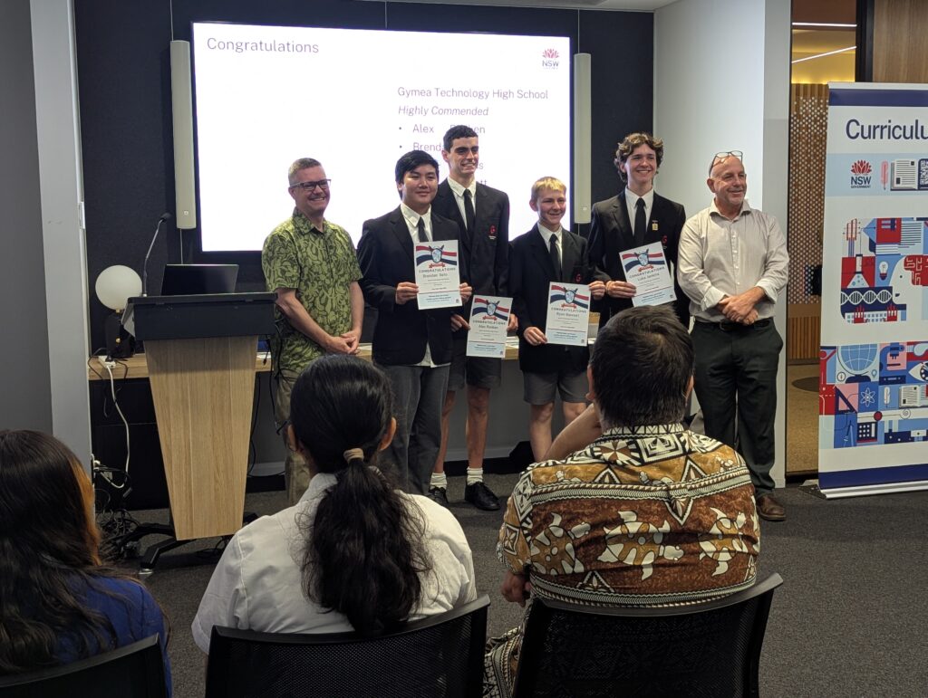 Gymea Technology High Year 11 team proudly show off certificates as GovHack High runners-up.