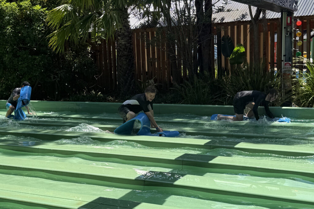Students enjoying waves and smiles at Jamberoo Rewards Excursion
