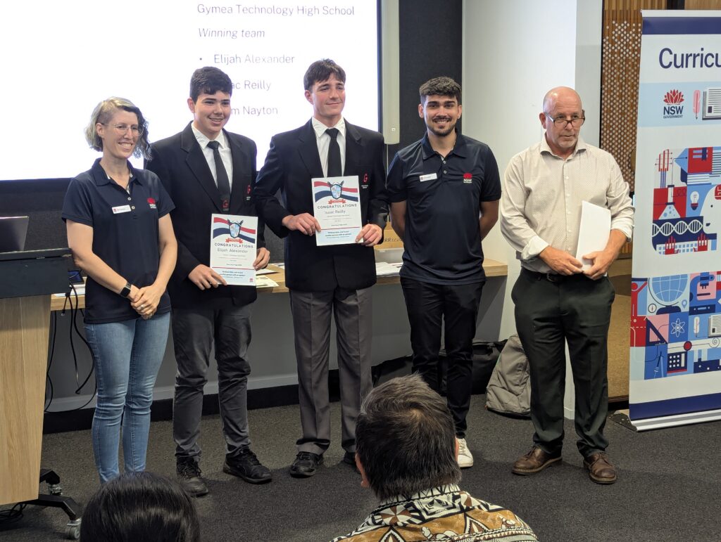 Year 9 Gymea Technology High team proudly show off certificates after first place at GovHack High.