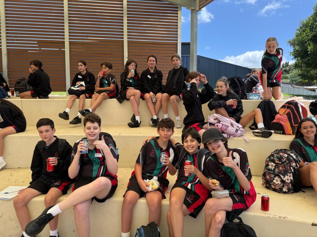 Year 7 are all smiles, enjoying a BBQ lunch as they begin their high school journey