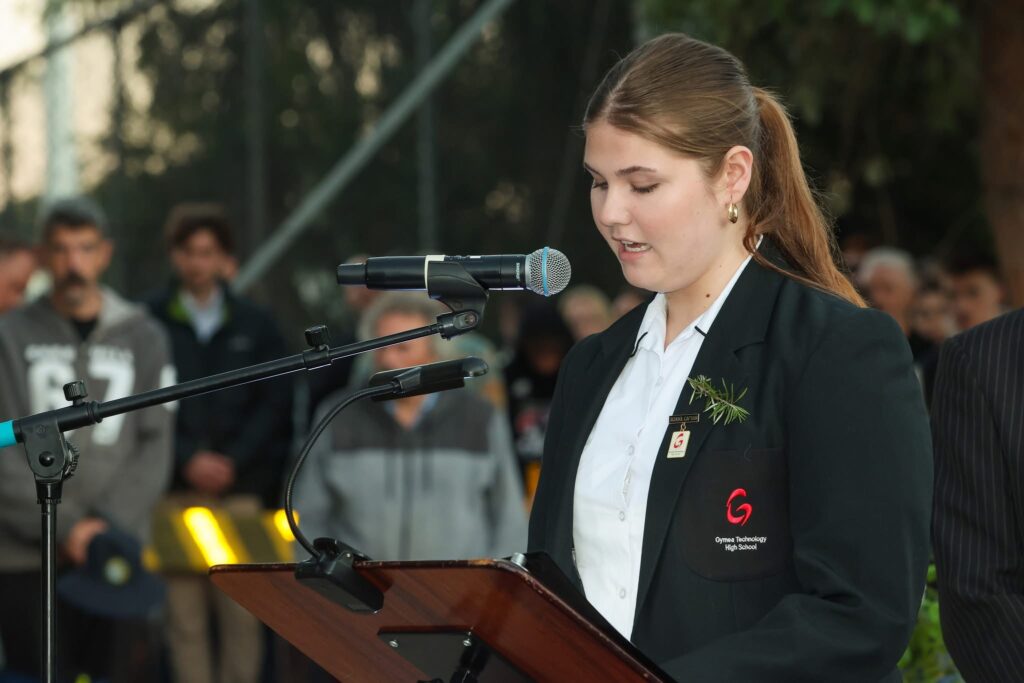 Our School Captain, Summer proudly leads the service in reading the Commemoration of the Fallen.