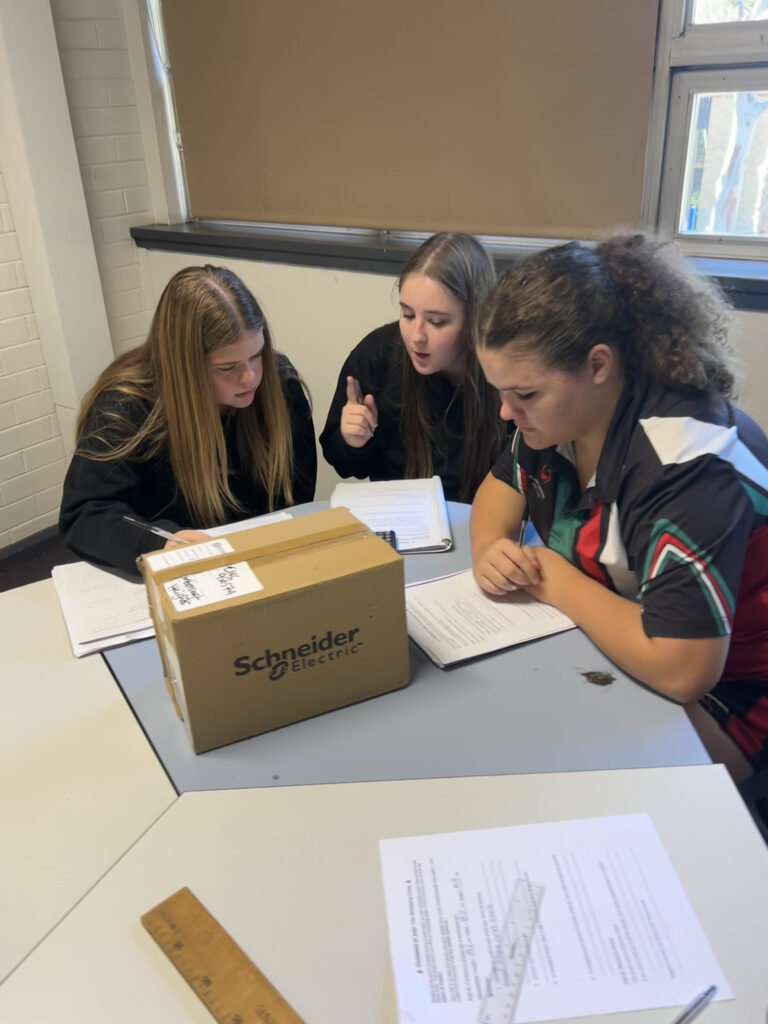 Hands-on STEM learning empowered students to apply mathematics creatively while minimising wrapping paper wastage.