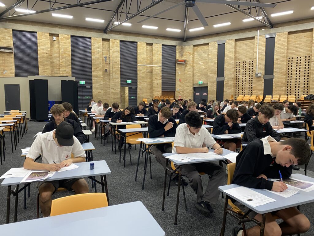 Focused students demonstrating confidence, resilience, and academic excellence during a high-achievement examination session.
