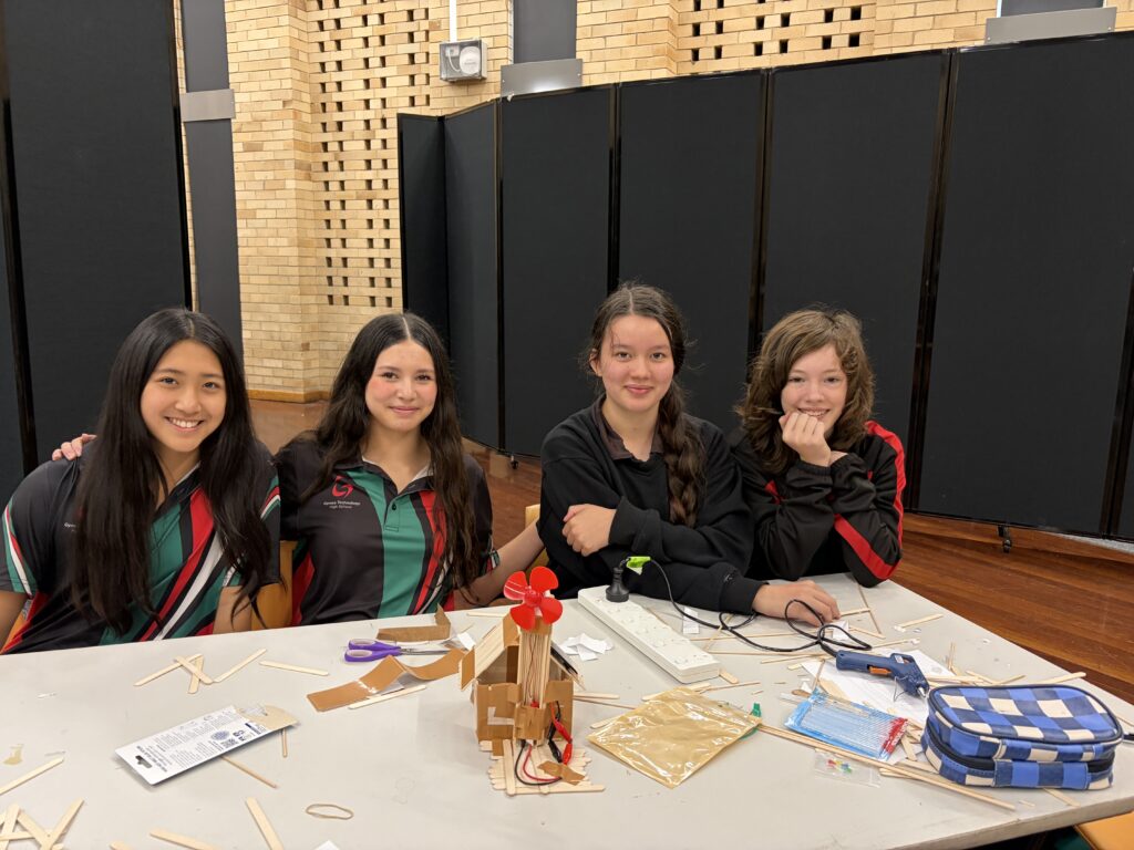 Students proudly showcased their creativity, teamwork, and engineering skills through innovative renewable energy designs.