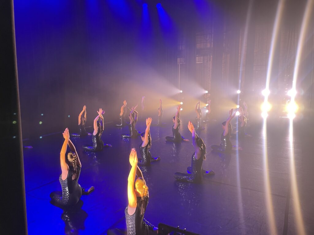 Grace, focus, and teamwork shine as dancers deliver a polished festival performance.