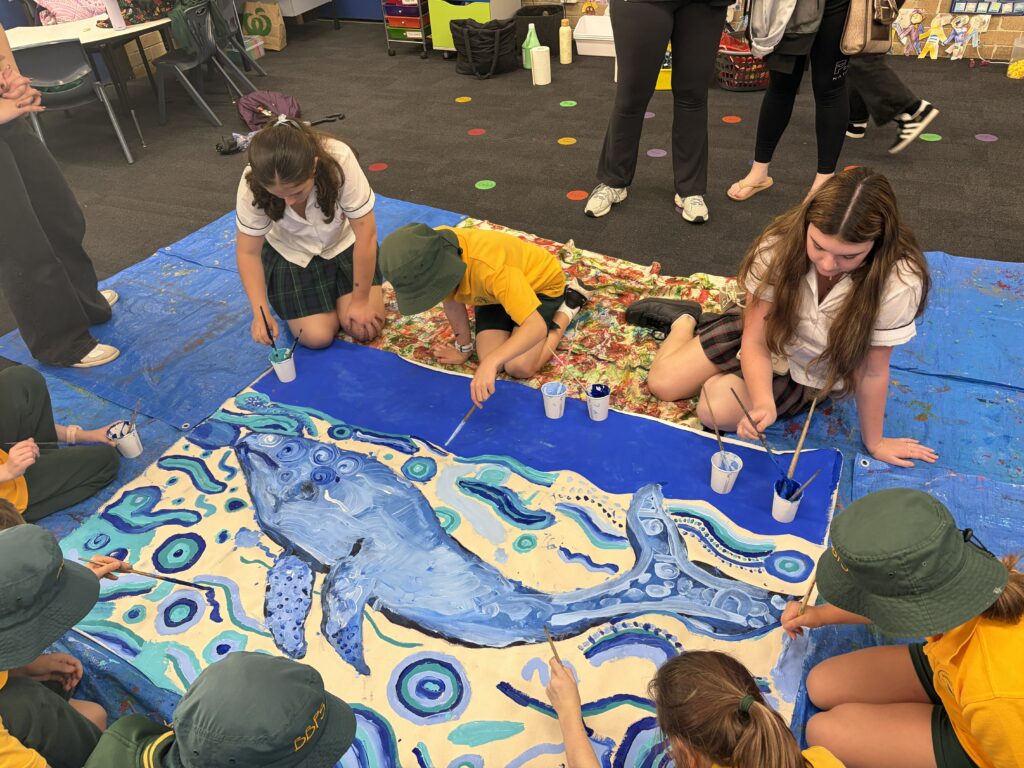 Students collaborated creatively to produce a vibrant artwork celebrating culture, connection, and teamwork