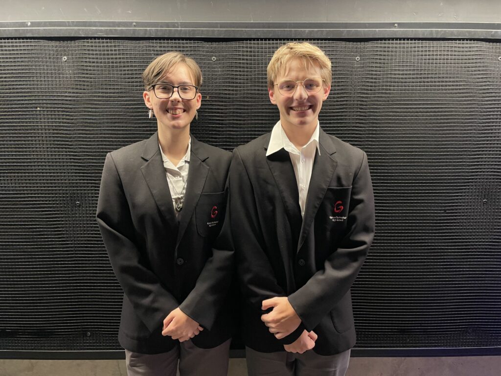 Students embrace teamwork and encouragement, building confidence before their performance