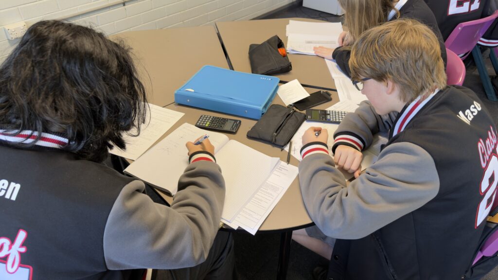 Teamwork and determination drive success as students refine advanced mathematical skills