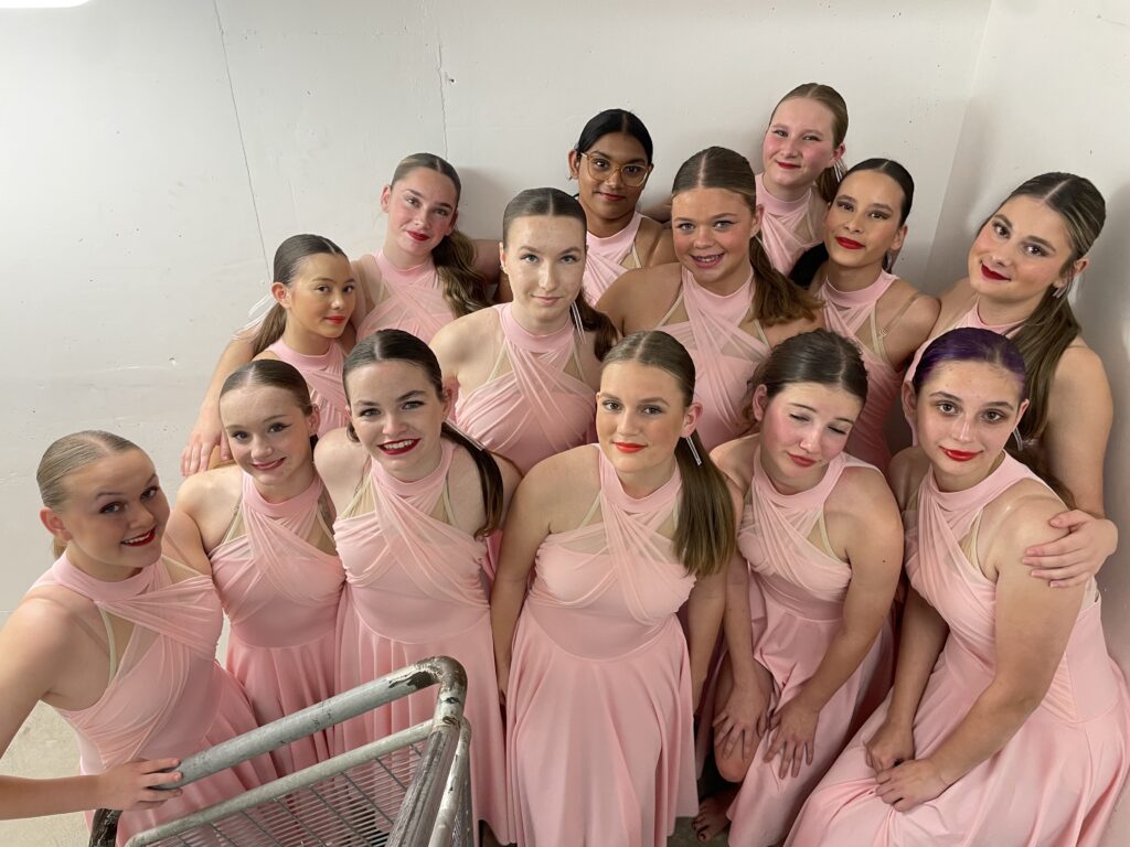Year 9 dancers celebrate collaboration, confidence and achievement before taking the stage.