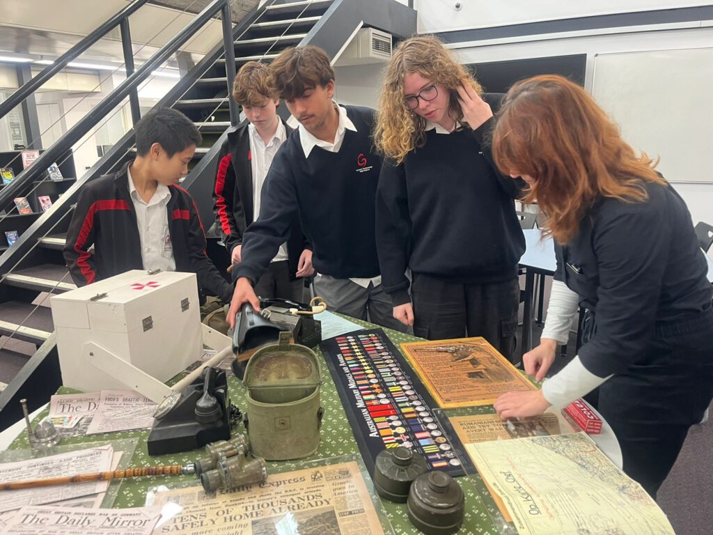 Students collaborated to investigate authentic wartime artefacts, strengthening historical understanding through hands-on discovery.
